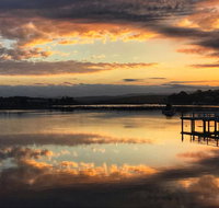 Reflections on Merimbula Lake - Lightning Ridge Tourism